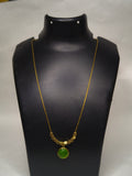 cubes and green stone pendant.