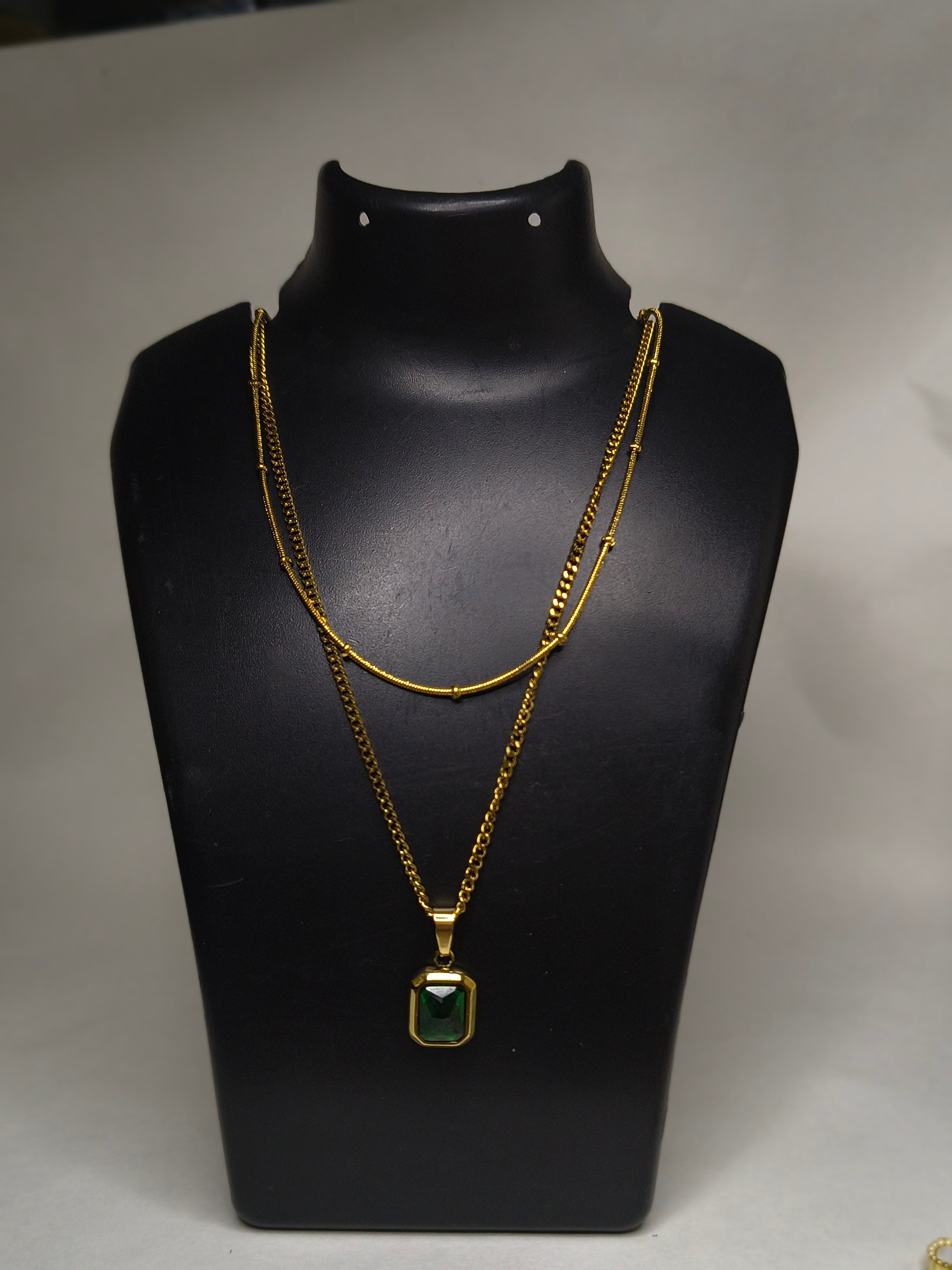 Dual layered emerald green crystal pendant