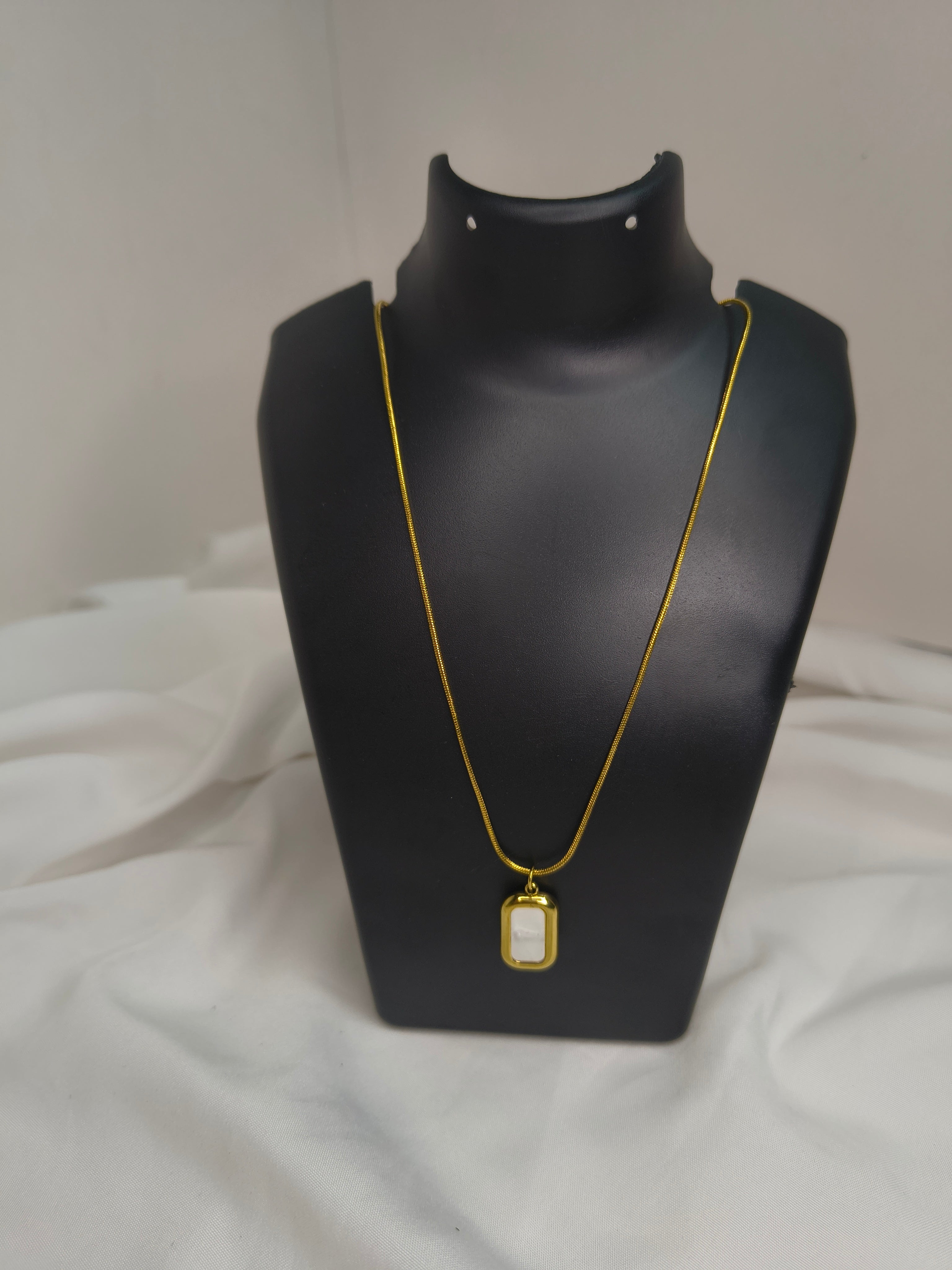 White stone chain pendant